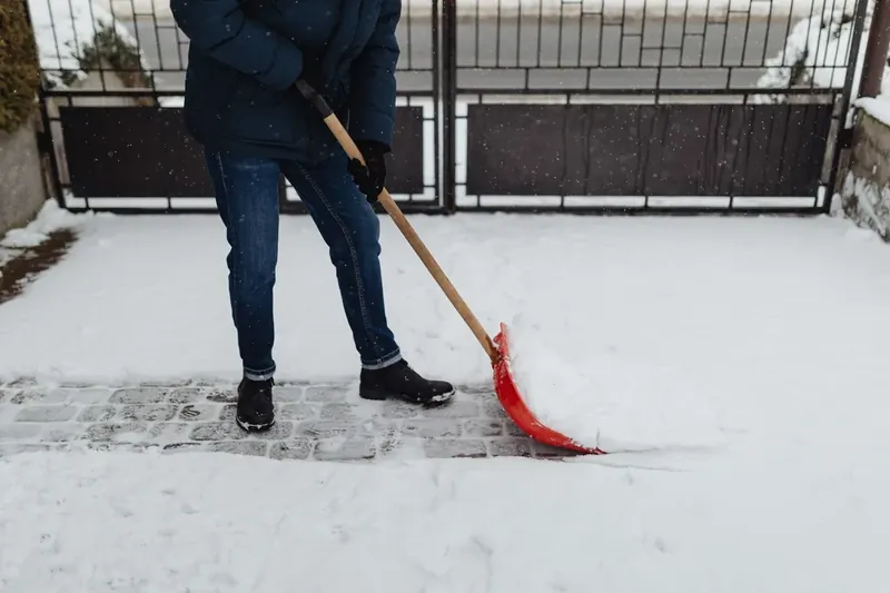 A walkway cleared down to the pavement after service