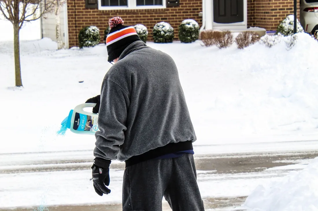 A driveway cleared to the pavement and salted by morning